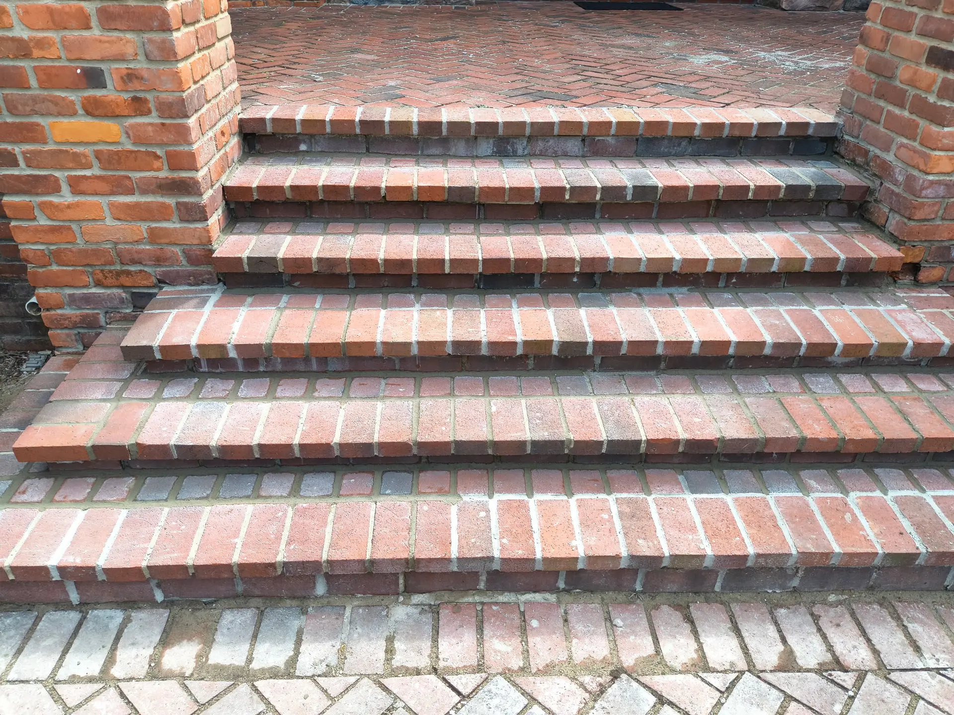 Rebuilt brick front steps by Patriot Masonry