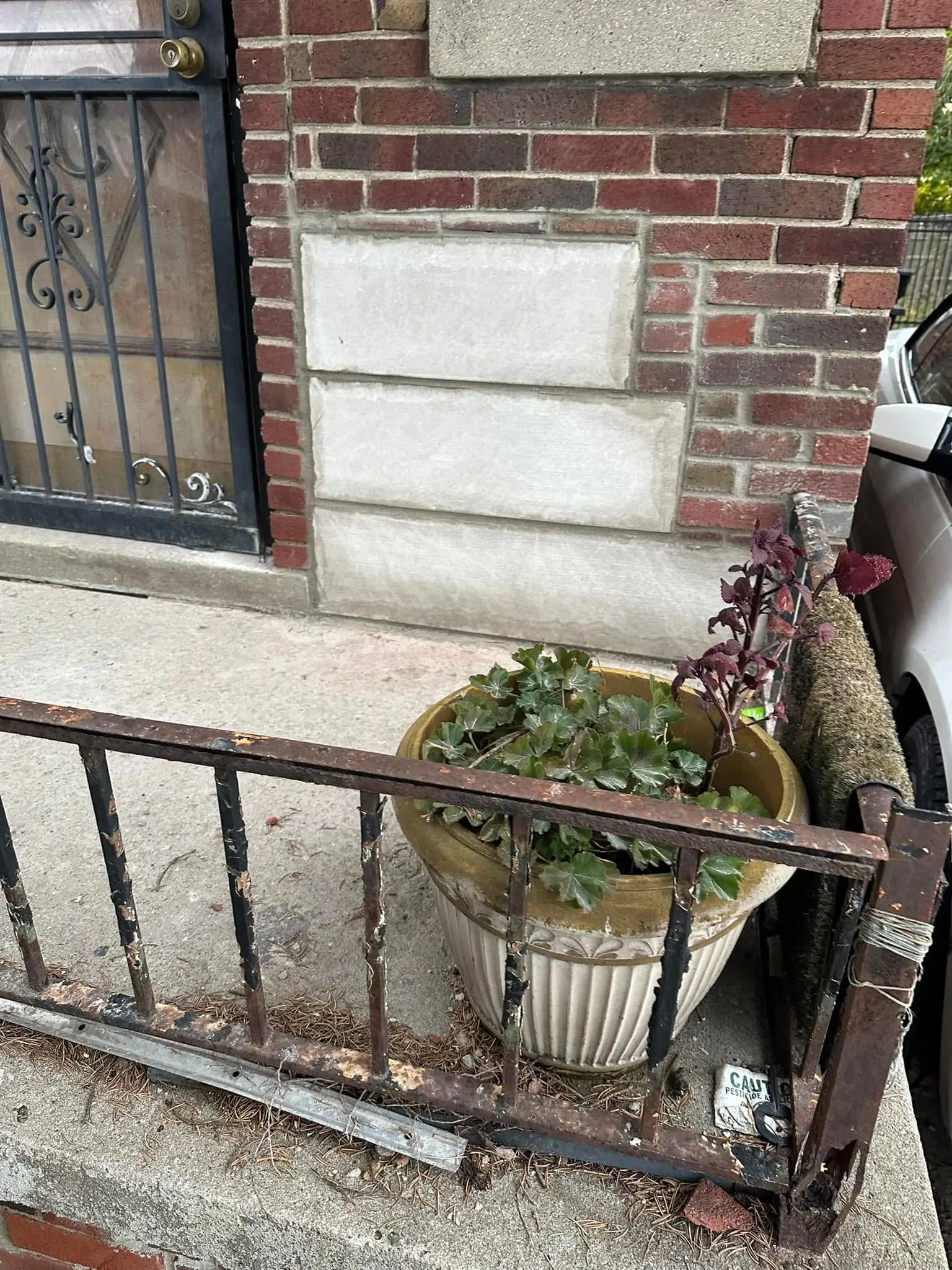Brick repair and repointing around a residential entry