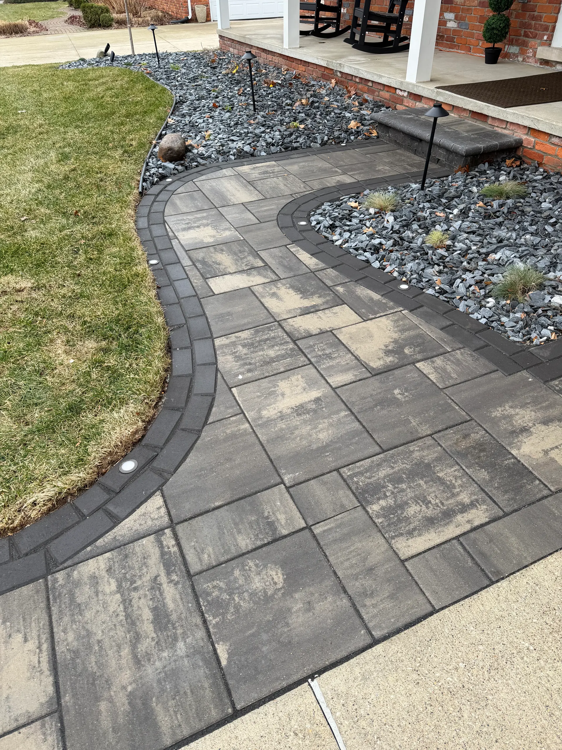Curved paver walkway craftsmanship by Patriot Masonry